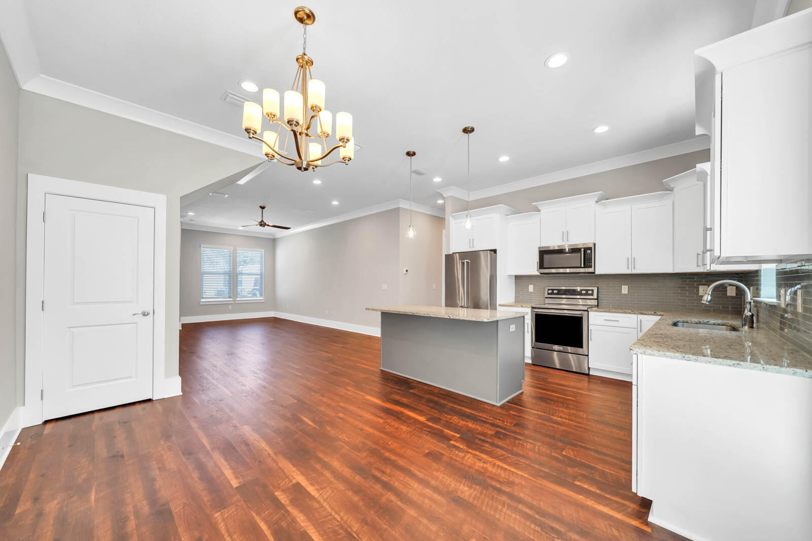 995 Airport Road, Unit 39 Destin, FL 32541 - Photo 7 of 37 a view of kitchen with sink microwave and stove