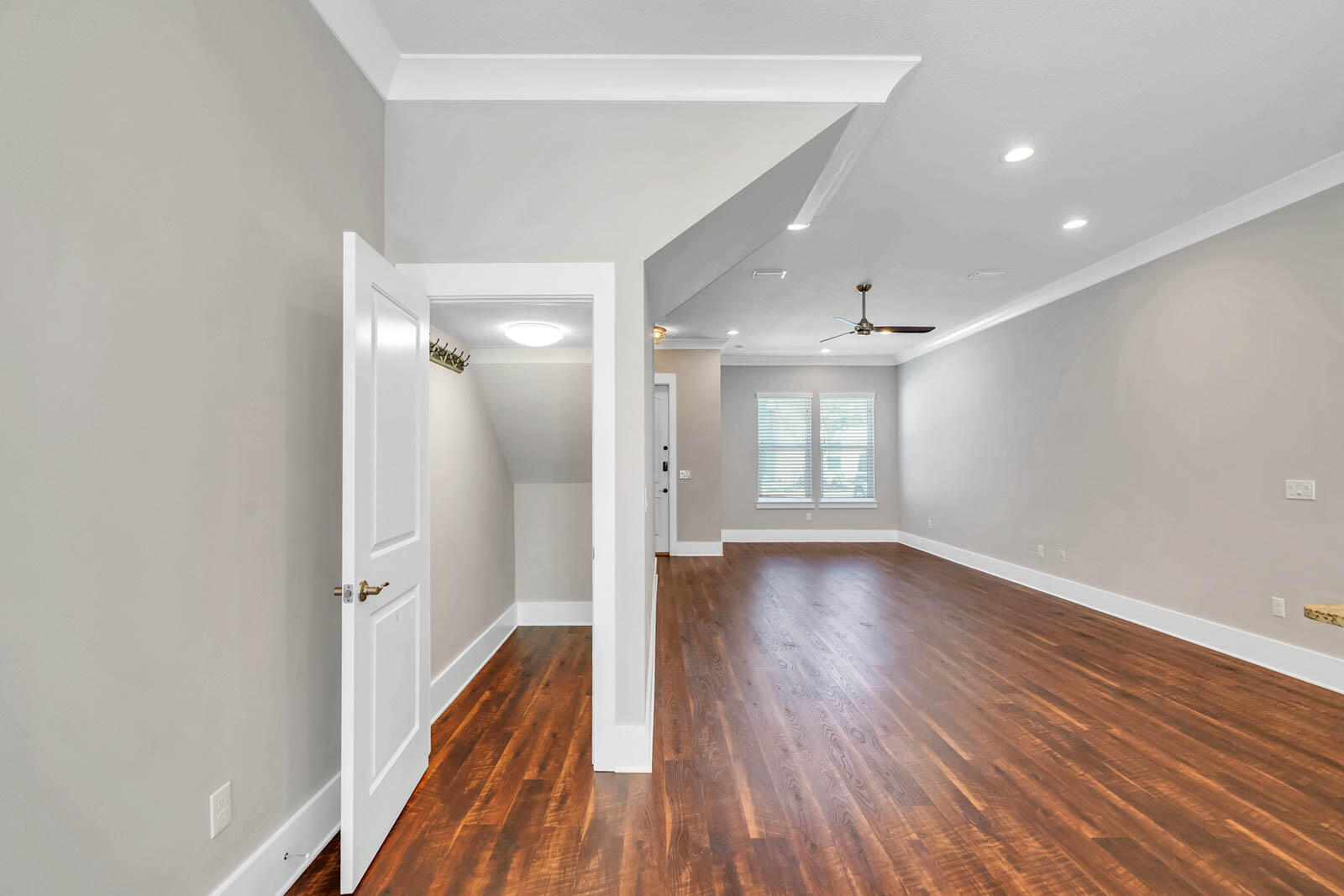 995 Airport Road, Unit 39 Destin, FL 32541 - Photo 9 of 37 a view of empty room with wooden floor and fan
