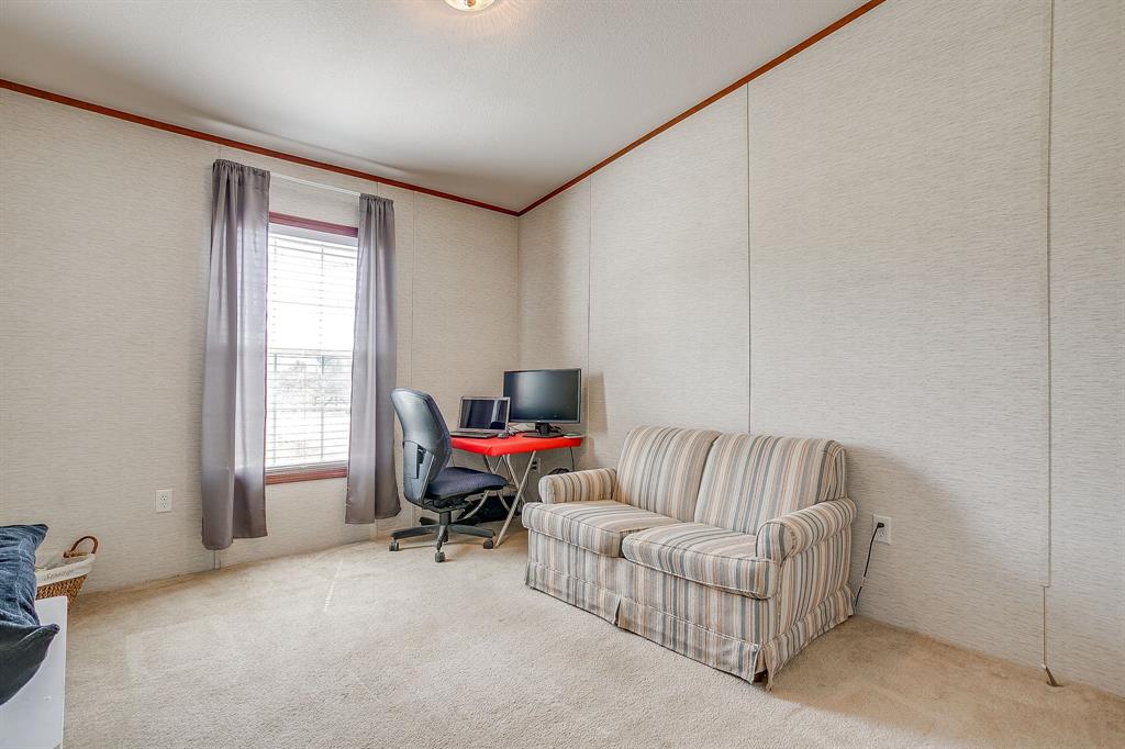 321 Young Road Millsap, TX 76066 - Photo 24 of 28 a living room with furniture and a window