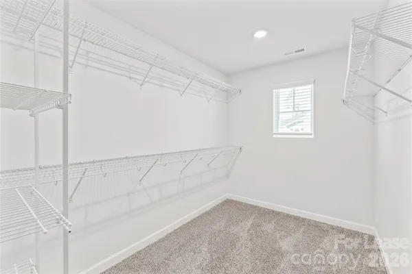 a bathroom with a double vanity sink mirror and double