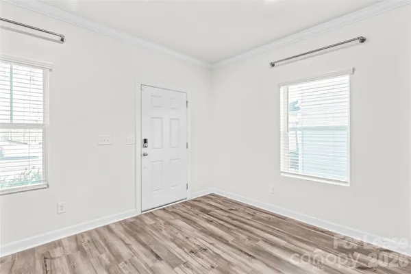 a view of a room that has a window in it