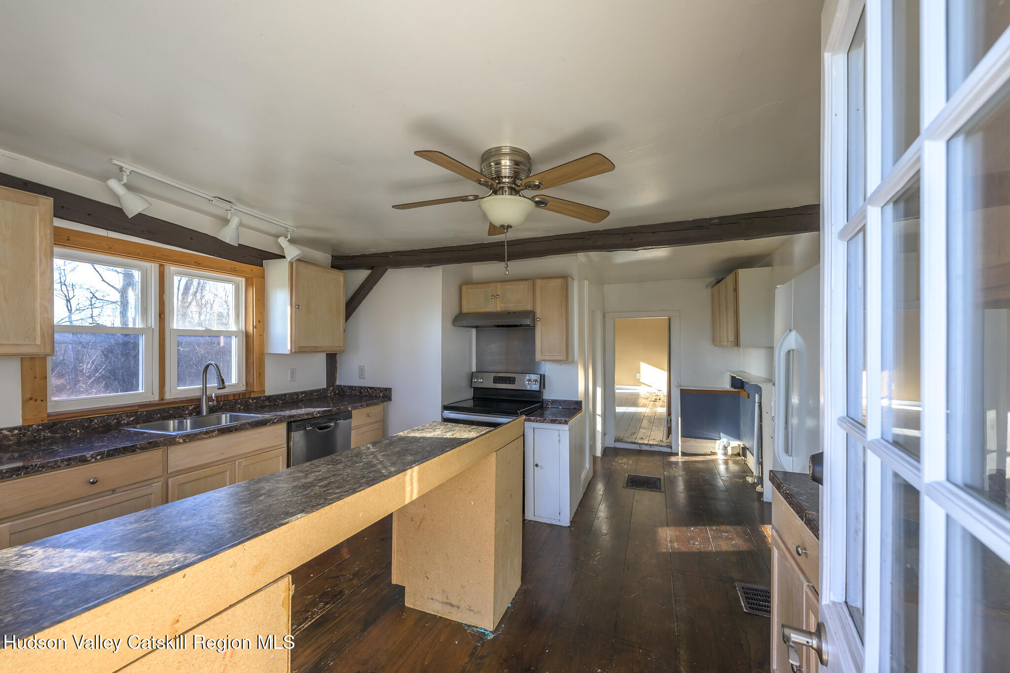 91 Scheller Park Road New Baltimore, NY 12192 - Photo 14 of 26 a view of a living room and kitchen view