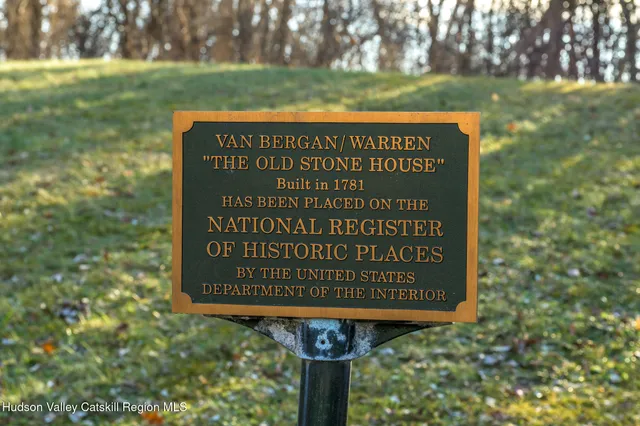 a sign on the side of the park