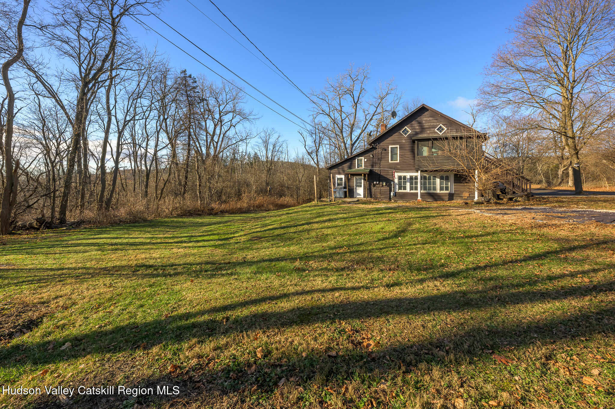 91 Scheller Park Road New Baltimore, NY 12192 - Photo 25 of 26 a front view of a house with a yard