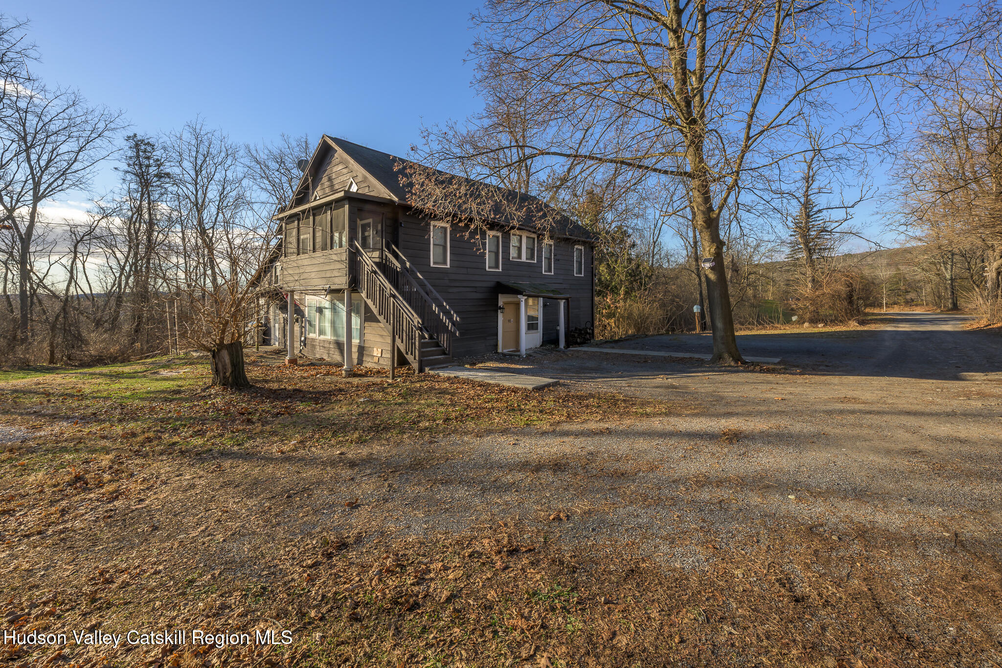 91 Scheller Park Road New Baltimore, NY 12192 - Photo 26 of 26 a view of a house with a snow in the yard