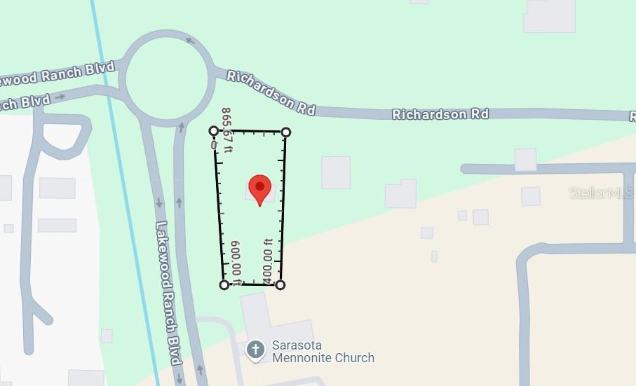 6440 Richardson Road Sarasota, FL 34240 - Photo 3 of 7 a picture of a bathroom with a sink and a mirror