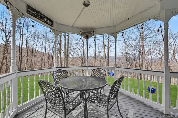 a view of balcony with furniture and outdoor seating