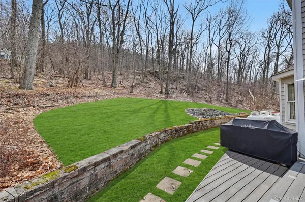 a view of a garden with an outdoor space