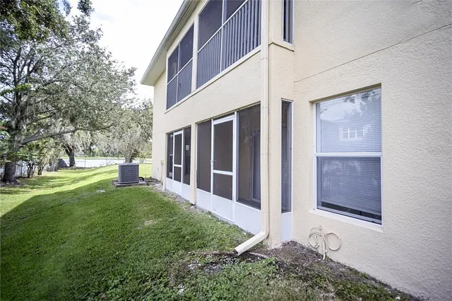 a view of a back yard of the house