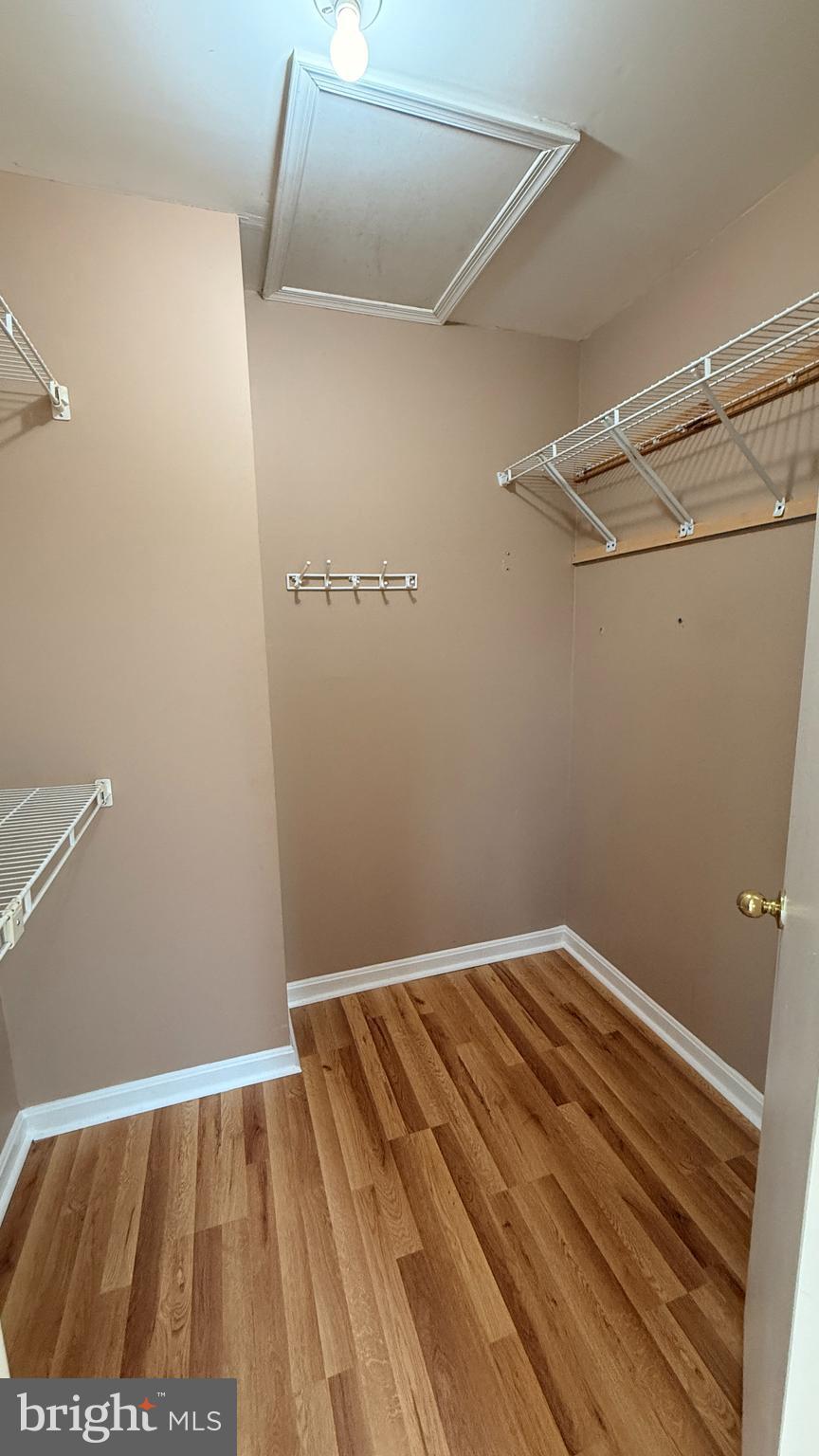 7907 Gambrill Court Springfield, VA 22153 - Photo 17 of 35 a view of a room with wooden floor