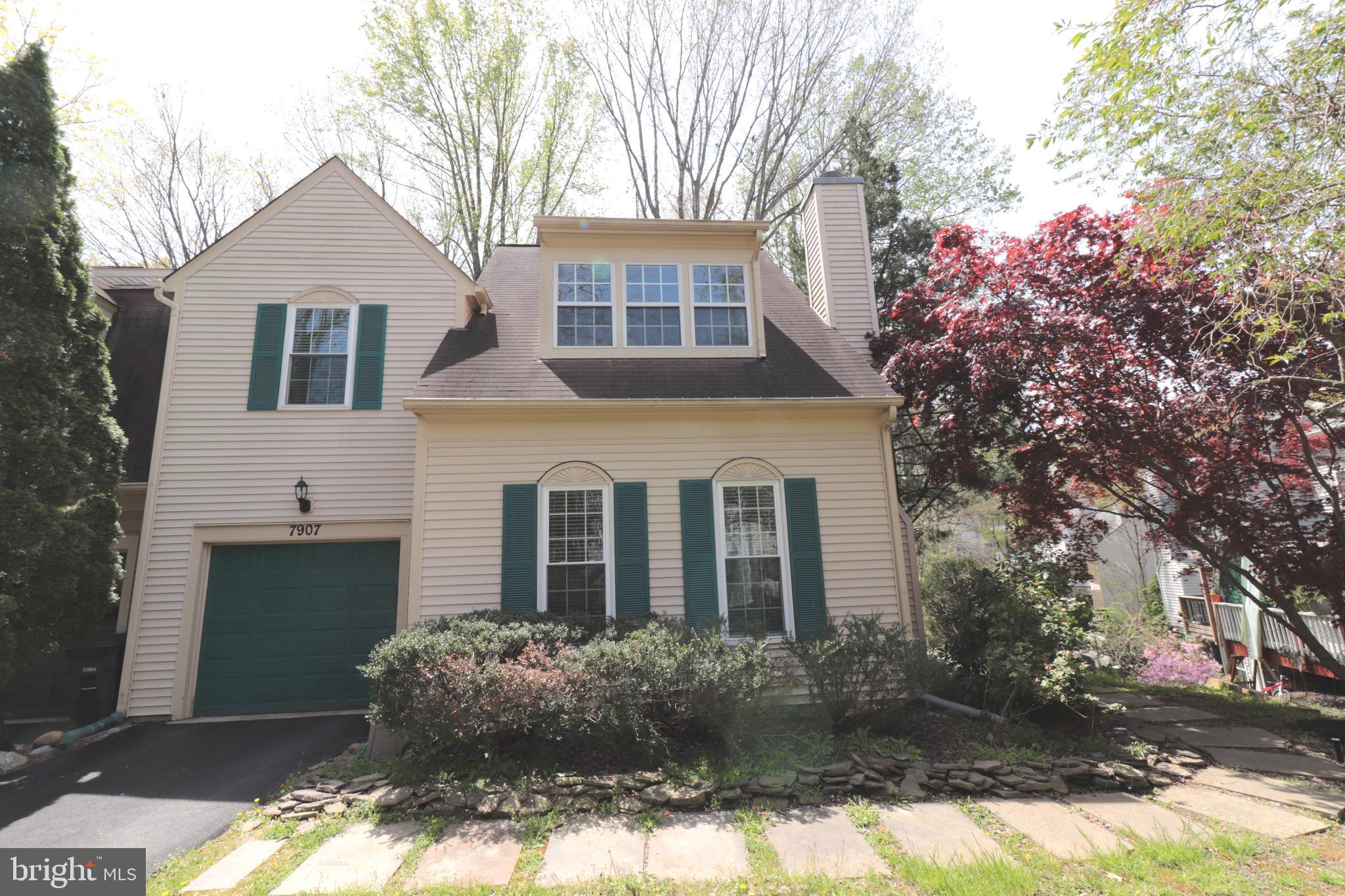 7907 Gambrill Court Springfield, VA 22153 - Photo 2 of 35 a front view of a house with garden