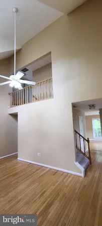 a view of a livingroom with wooden floor