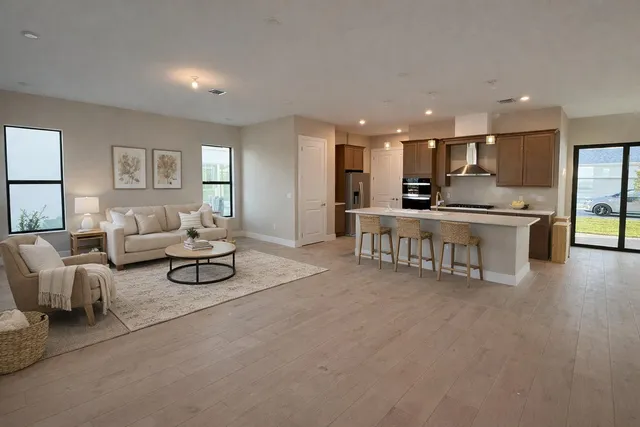 a living room with furniture and a table