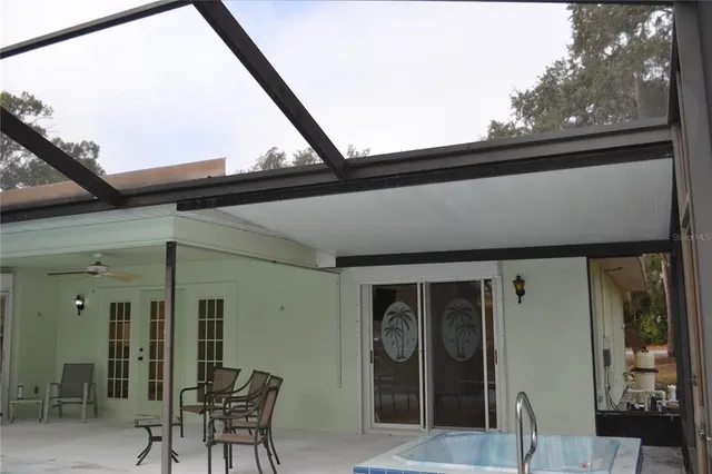 a glass top table with an outdoor space