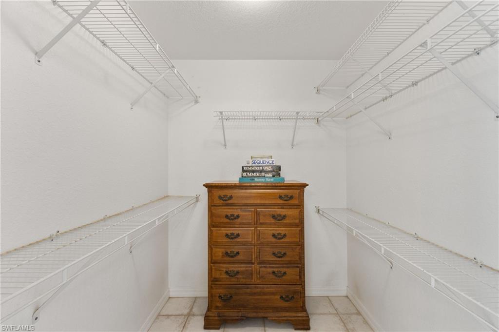 24060 Pyramid Way Punta Gorda, FL 33955 - Photo 24 of 48 Walk in closet featuring light tile patterned floors
