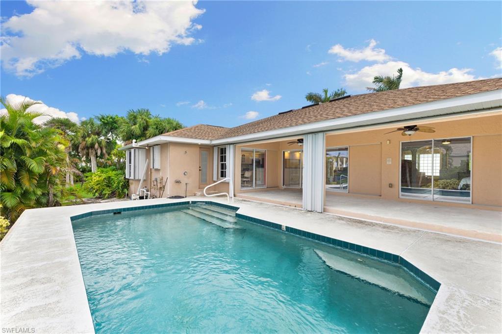 24060 Pyramid Way Punta Gorda, FL 33955 - Photo 30 of 48 View of swimming pool with a patio area and ceiling fan