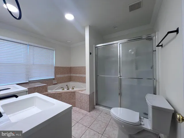 a bathroom with a sink and a bathtub