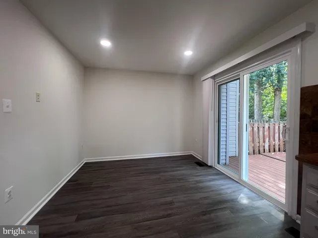 a view of entryway with wooden floor