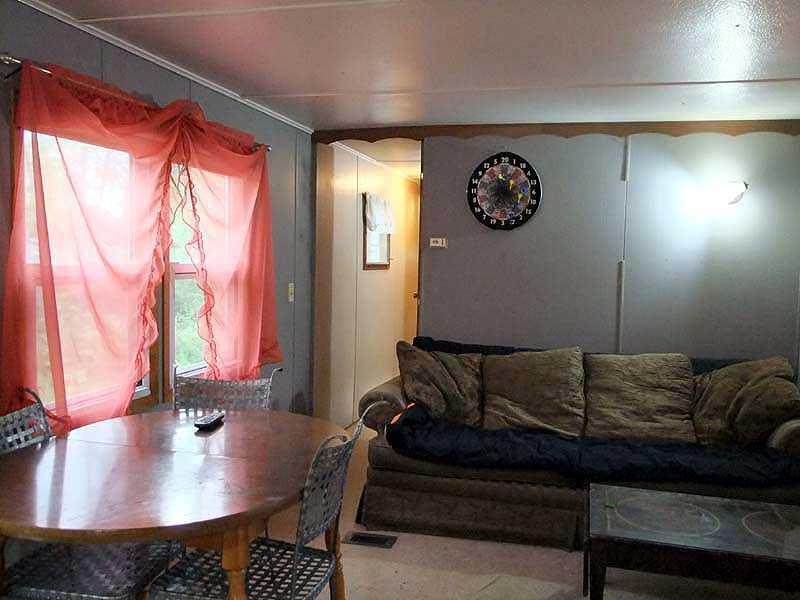 56-60 Thompson Settlement Road Oakfield, ME 04763 - Photo 20 of 35 Living Room.