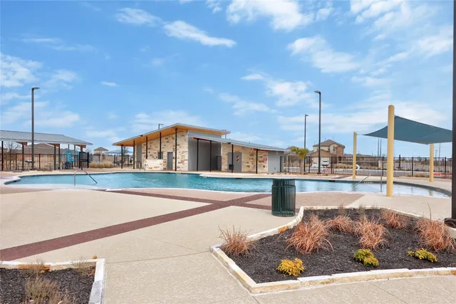 a view of yard with patio