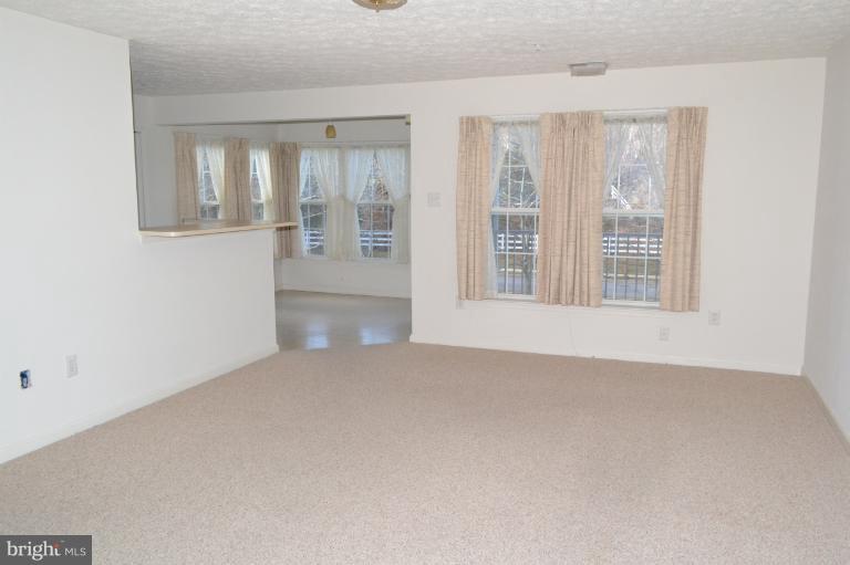 4922 Riders Court, Unit 4922 Owings Mills, MD 21117 - Photo 1 of 11 Living Room