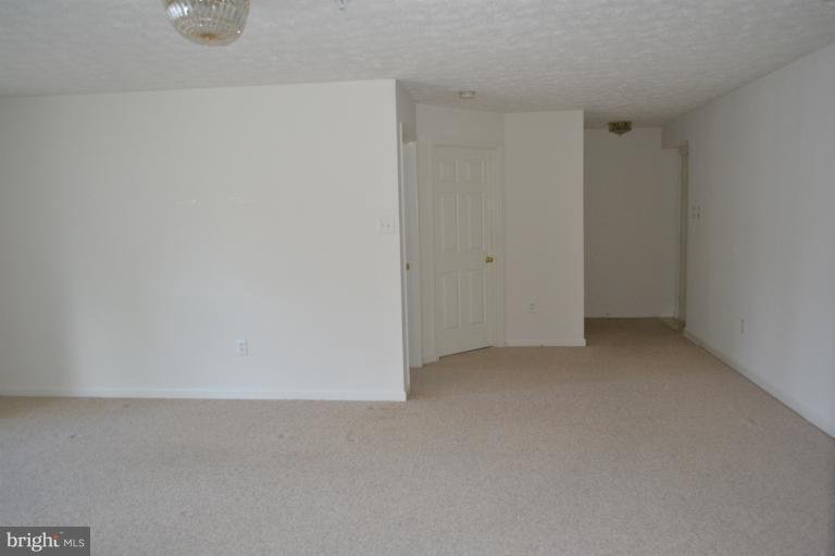 4922 Riders Court, Unit 4922 Owings Mills, MD 21117 - Photo 9 of 11 Living Room