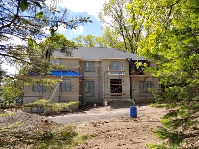 5 East Willow Tree Road Spring Valley, NY 10977 - Photo 1 of 1 a front view of a house with a yard