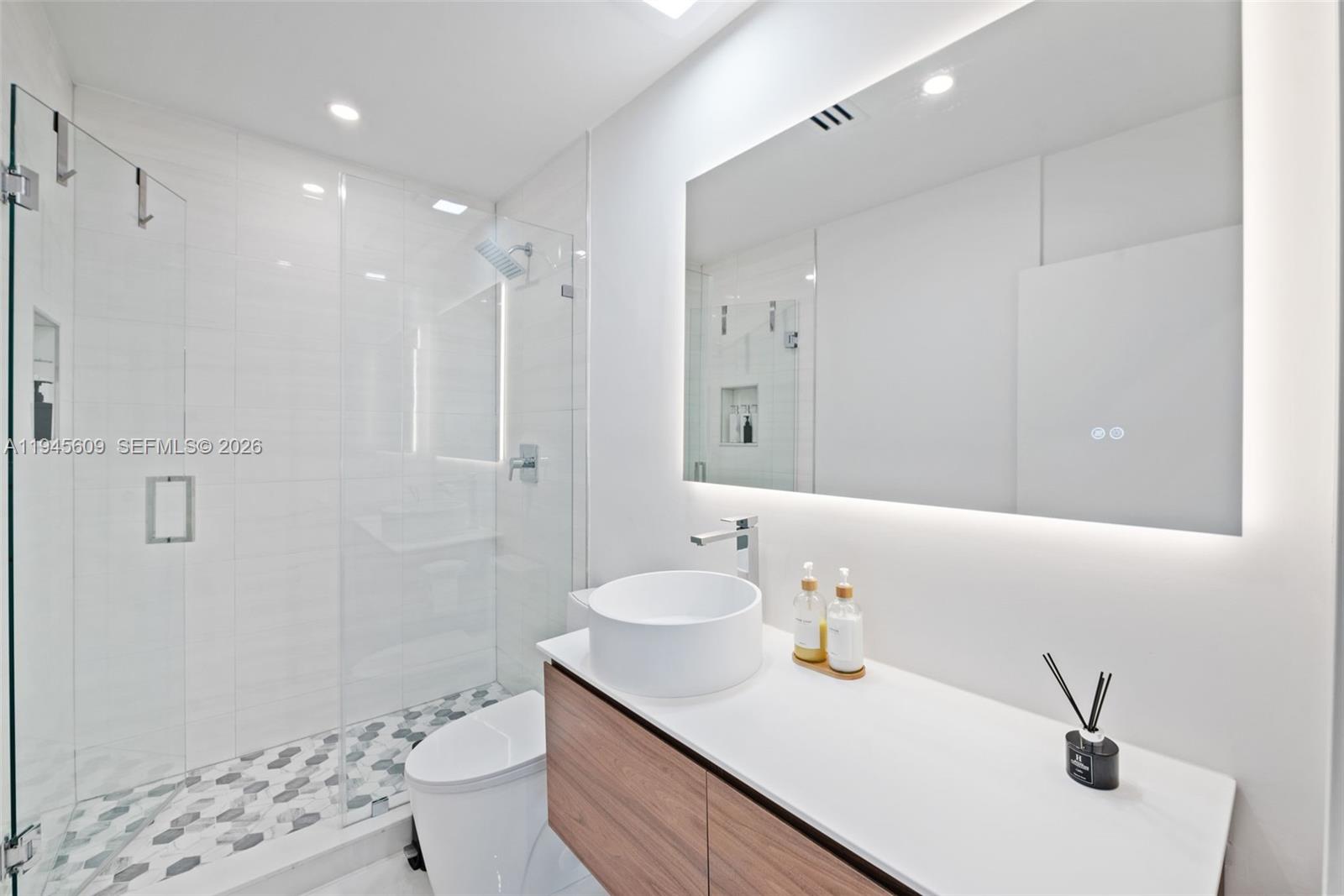 2180 Southwest 20th Street Miami, FL 33145 - Photo 20 of 25 a bathroom with a sink toilet and shower