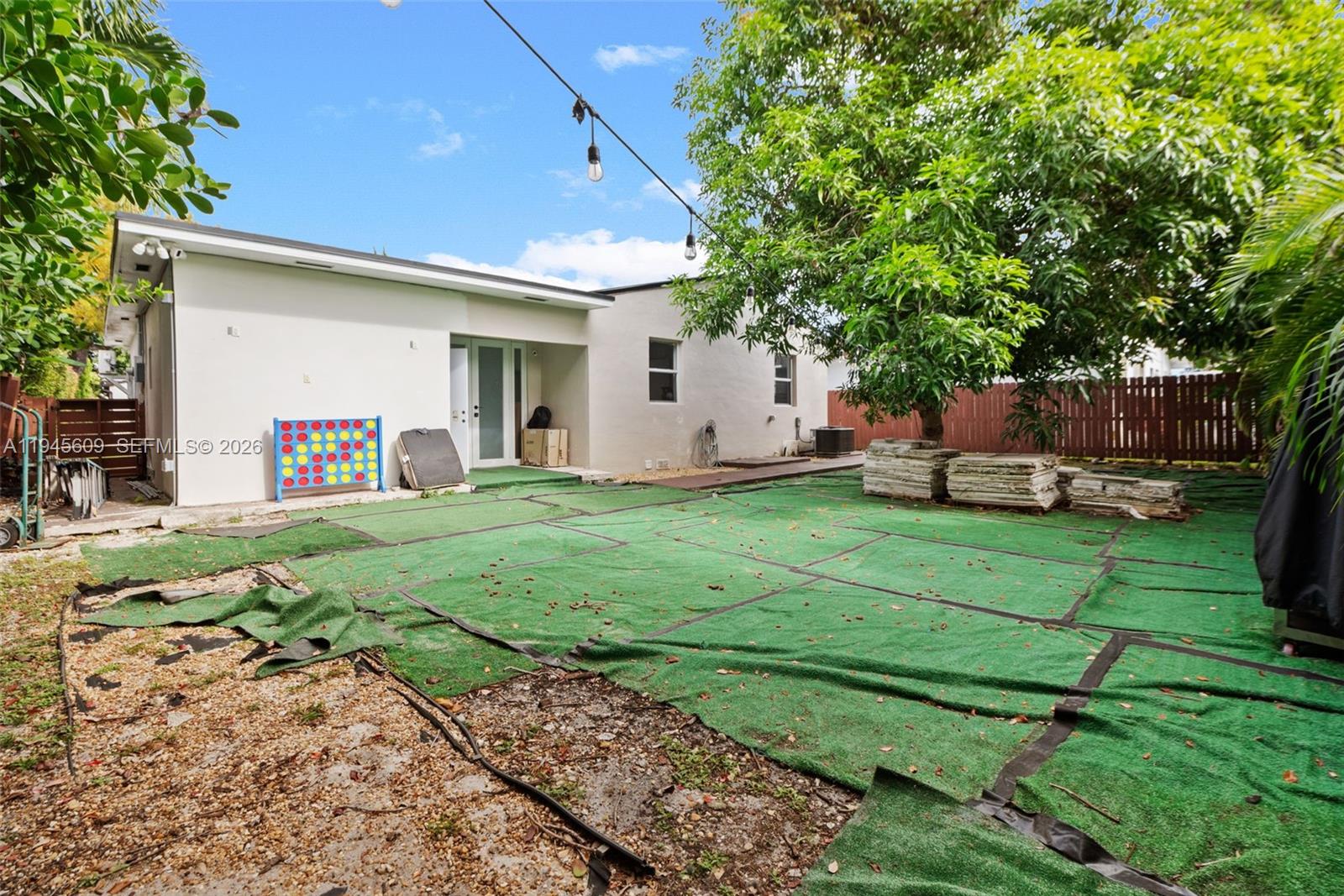 2180 Southwest 20th Street Miami, FL 33145 - Photo 24 of 25 a view of a house with a yard