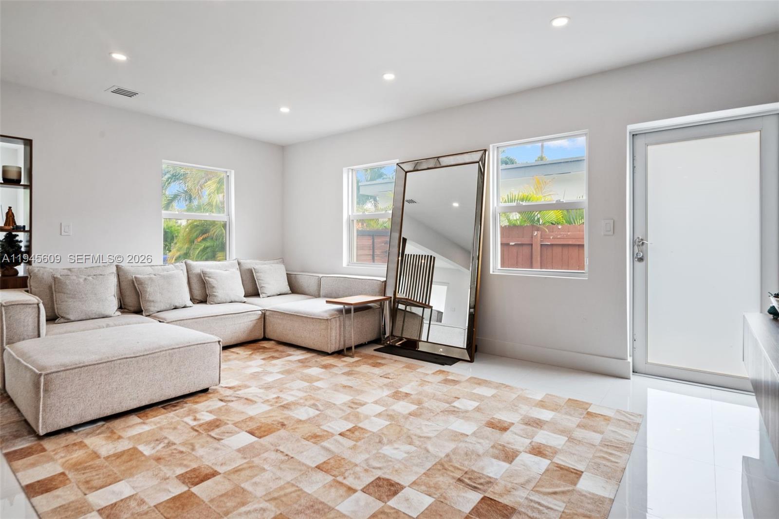 2180 Southwest 20th Street Miami, FL 33145 - Photo 5 of 25 a spacious bedroom with a bed and a window