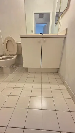 a bathroom with a toilet