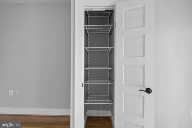 a view of a room with rack on the wall