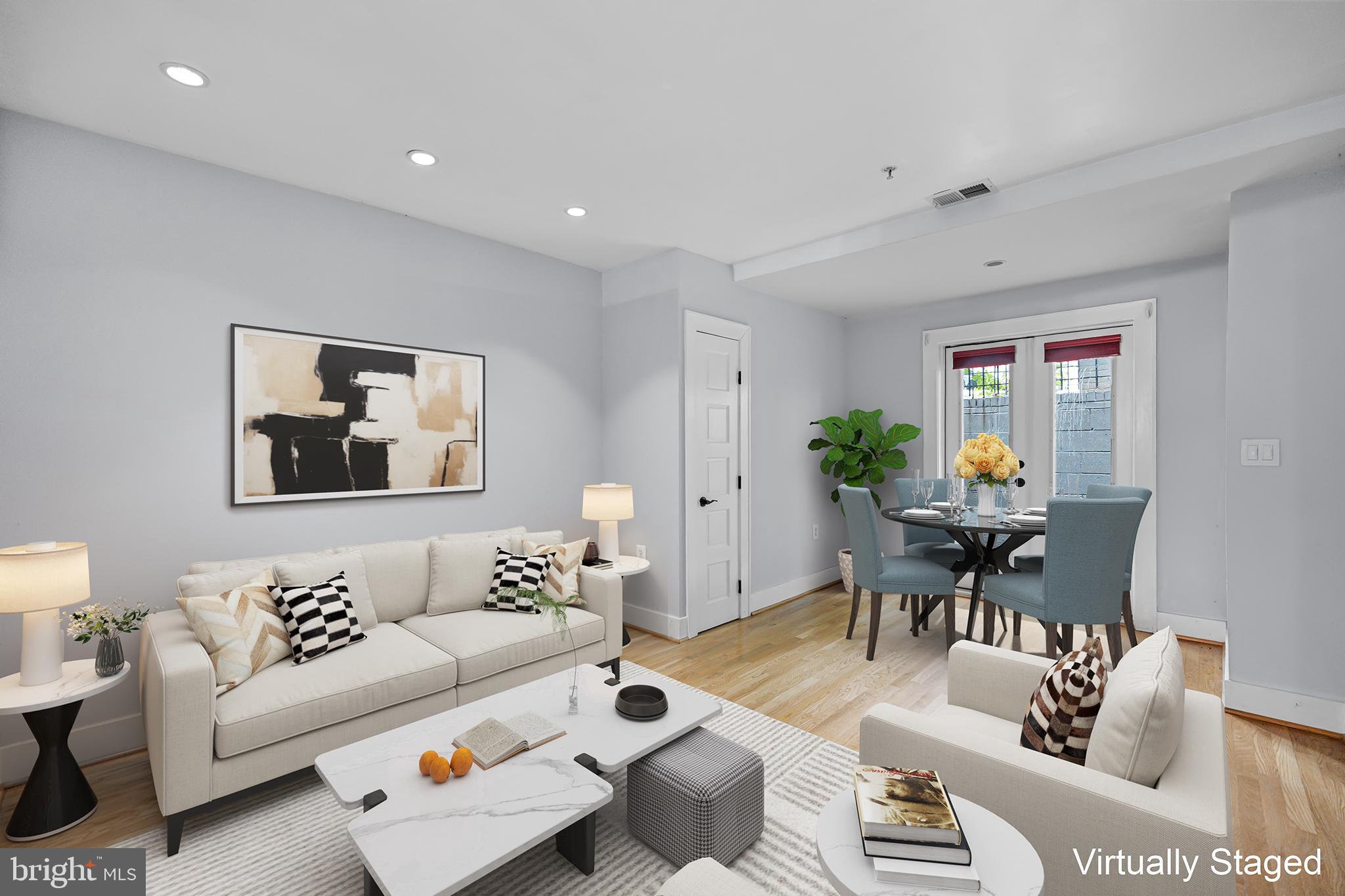 1109 M Street Northwest, Unit 1 Washington, DC 20005 - Photo 15 of 32 a living room with furniture and wooden floor