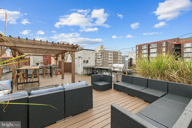 a kitchen with a stove and a refrigerator