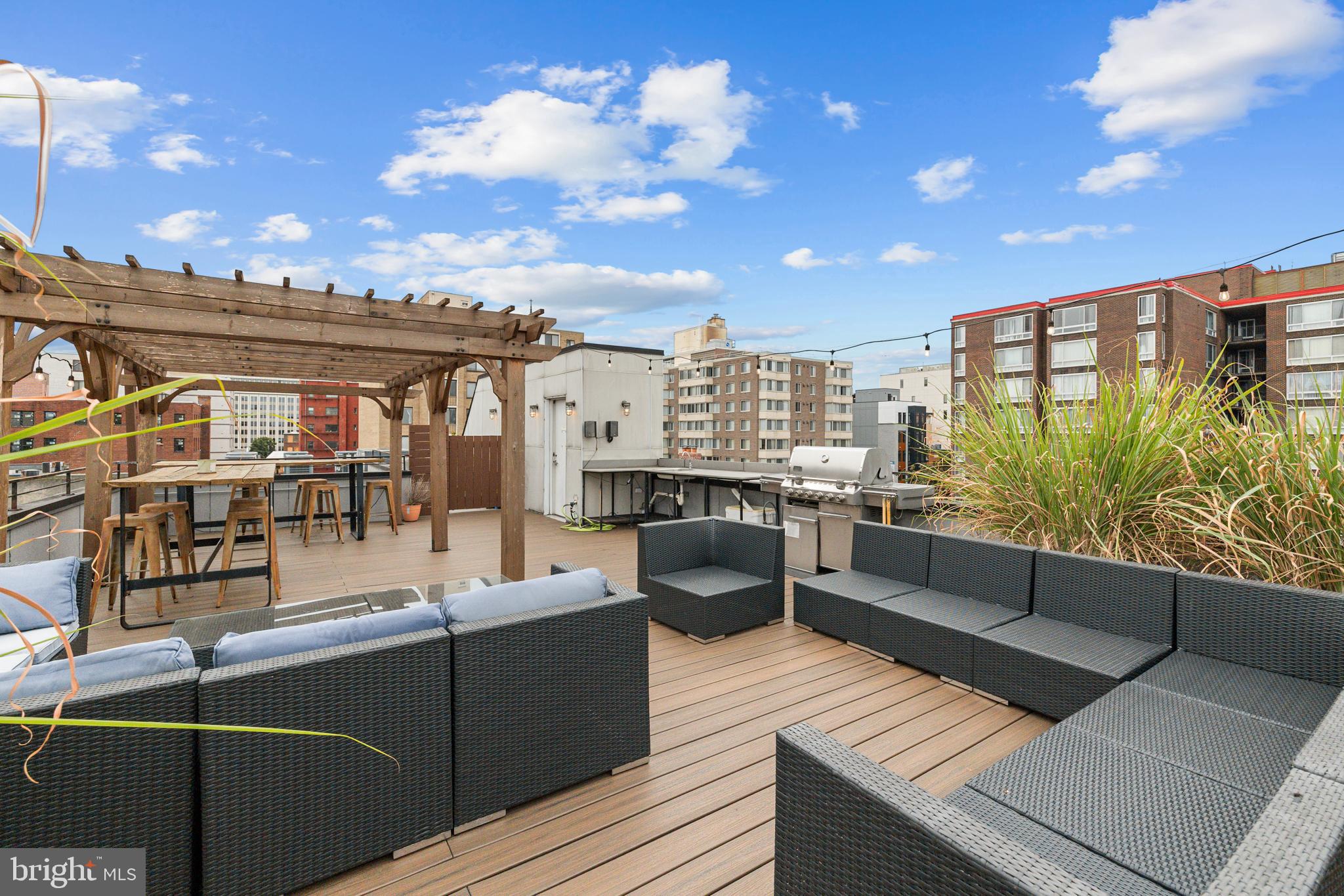 1109 M Street Northwest, Unit 1 Washington, DC 20005 - Photo 28 of 32 a view of a balcony with chairs