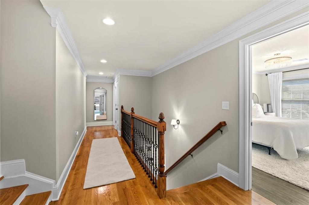 1002 Tyle Street Northwest Kennesaw, GA 30152 - Photo 51 of 83 a view of a hallway with windows and stairs