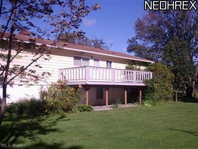 8030 Center Road Ashtabula, OH 44004 - Photo 2 of 5 large deck overlooking the back yard.