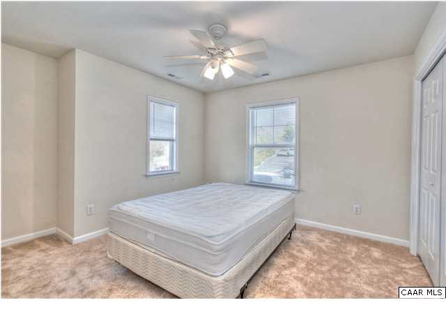 1357 Stoney Ridge Road Charlottesville, VA 22902 - Photo 8 of 10 a living room with a bed furniture and a window