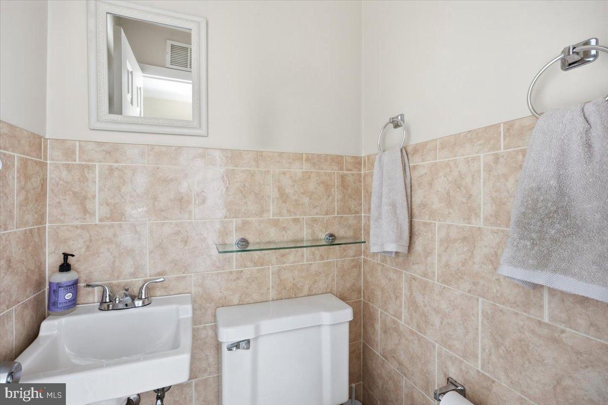 86 Via Cascata Drive Clementon, NJ 08021 - Photo 16 of 27 Chic bathroom with elegant tile accents.