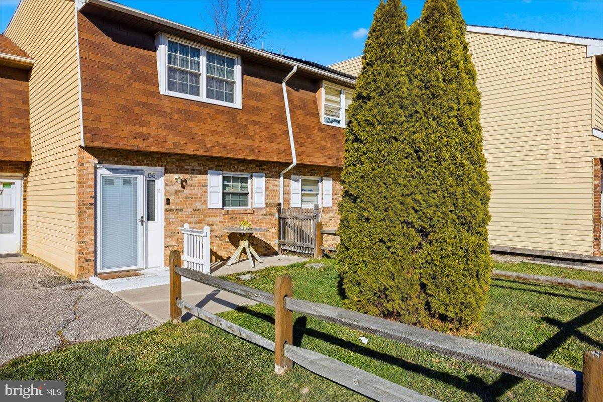 86 Via Cascata Drive Clementon, NJ 08021 - Photo 2 of 27 Charming townhouse with lush greenery.