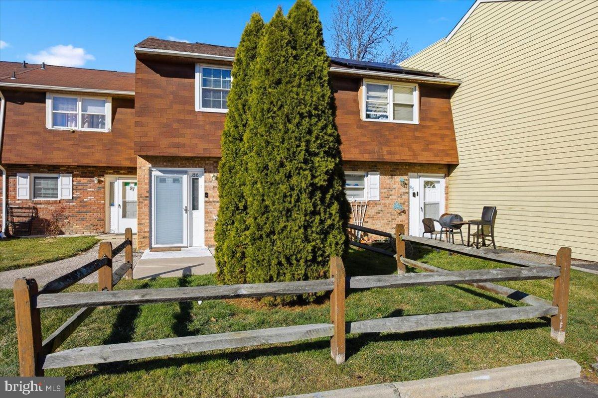 86 Via Cascata Drive Clementon, NJ 08021 - Photo 3 of 27 Charming townhouse with lush greenery.