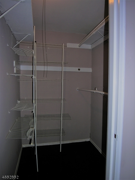 1143 Valley Road, Unit 1143 Wayne, NJ 07470 - Photo 20 of 25 a bathroom with a shower