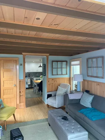 a living room with furniture and a couch