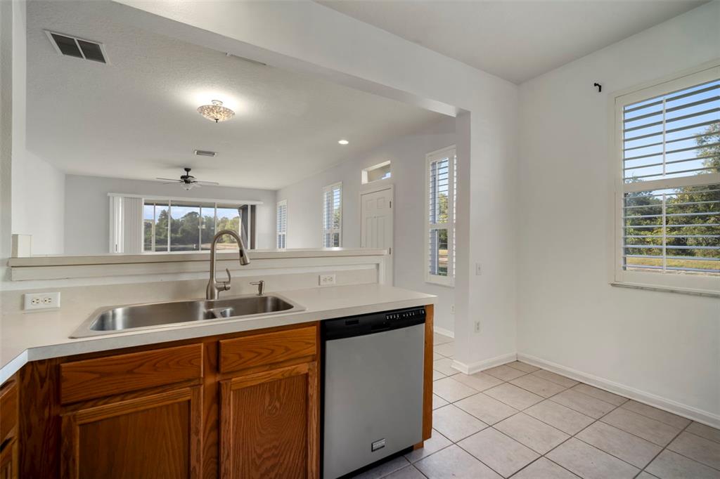 2802 Conch Hollow Drive Brandon, FL 33511 - Photo 23 of 74 a kitchen with a sink and cabinets