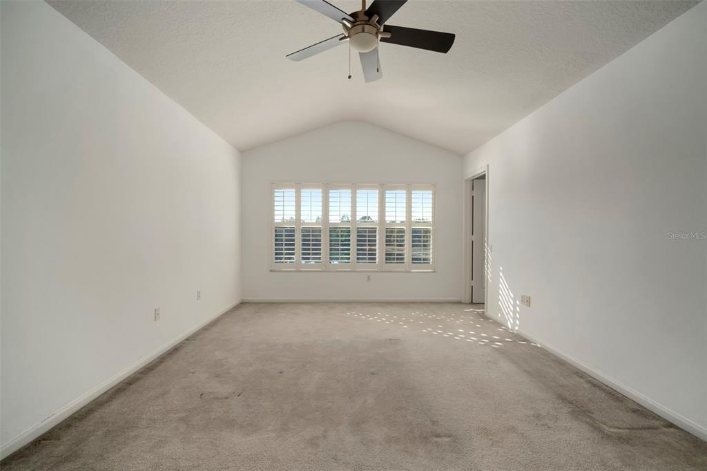 2802 Conch Hollow Drive Brandon, FL 33511 - Photo 31 of 74 wooden floor in an empty room with a window