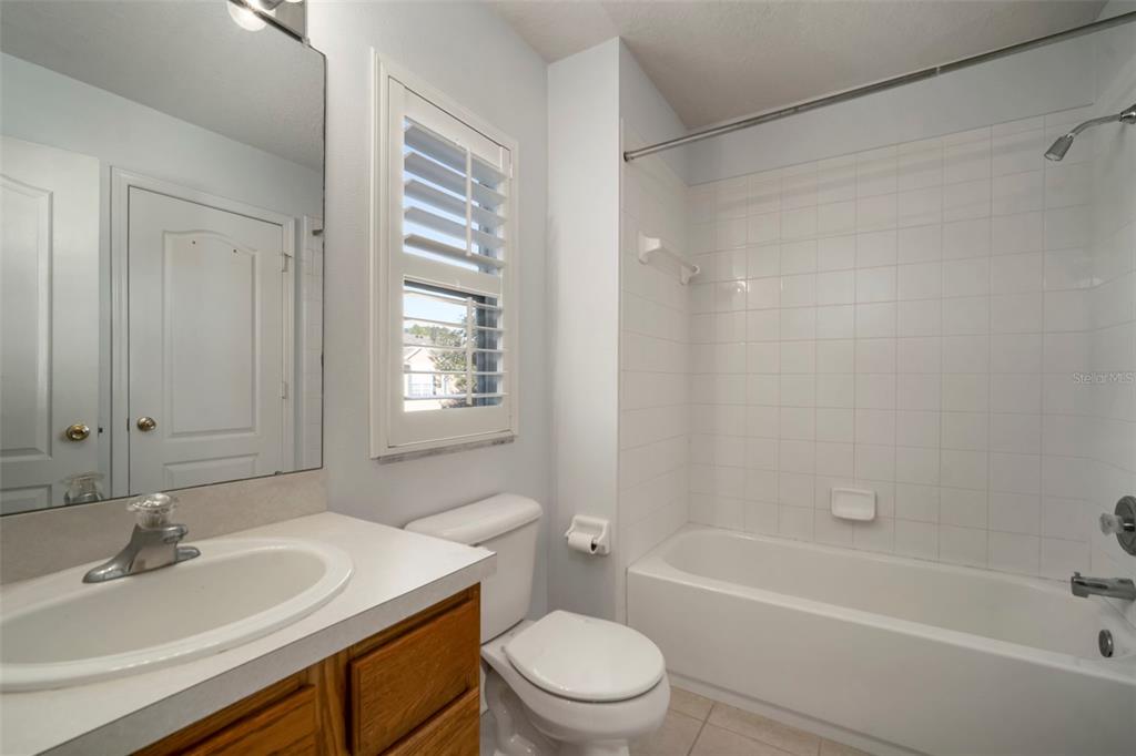 2802 Conch Hollow Drive Brandon, FL 33511 - Photo 42 of 74 a bathroom with a sink a toilet and a bathtub