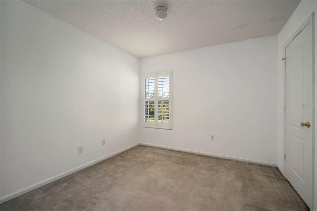 2802 Conch Hollow Drive Brandon, FL 33511 - Photo 44 of 74 a view of an empty room with a window