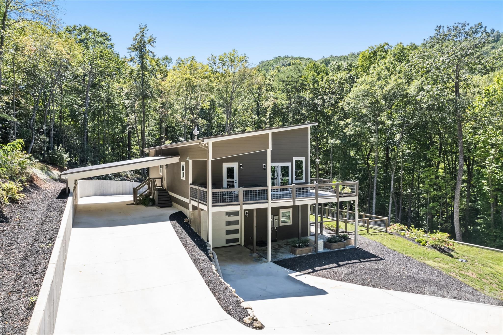 1185 Wallalieu Road Otto, NC 28763 - Photo 41 of 43 a view of a balcony with chairs