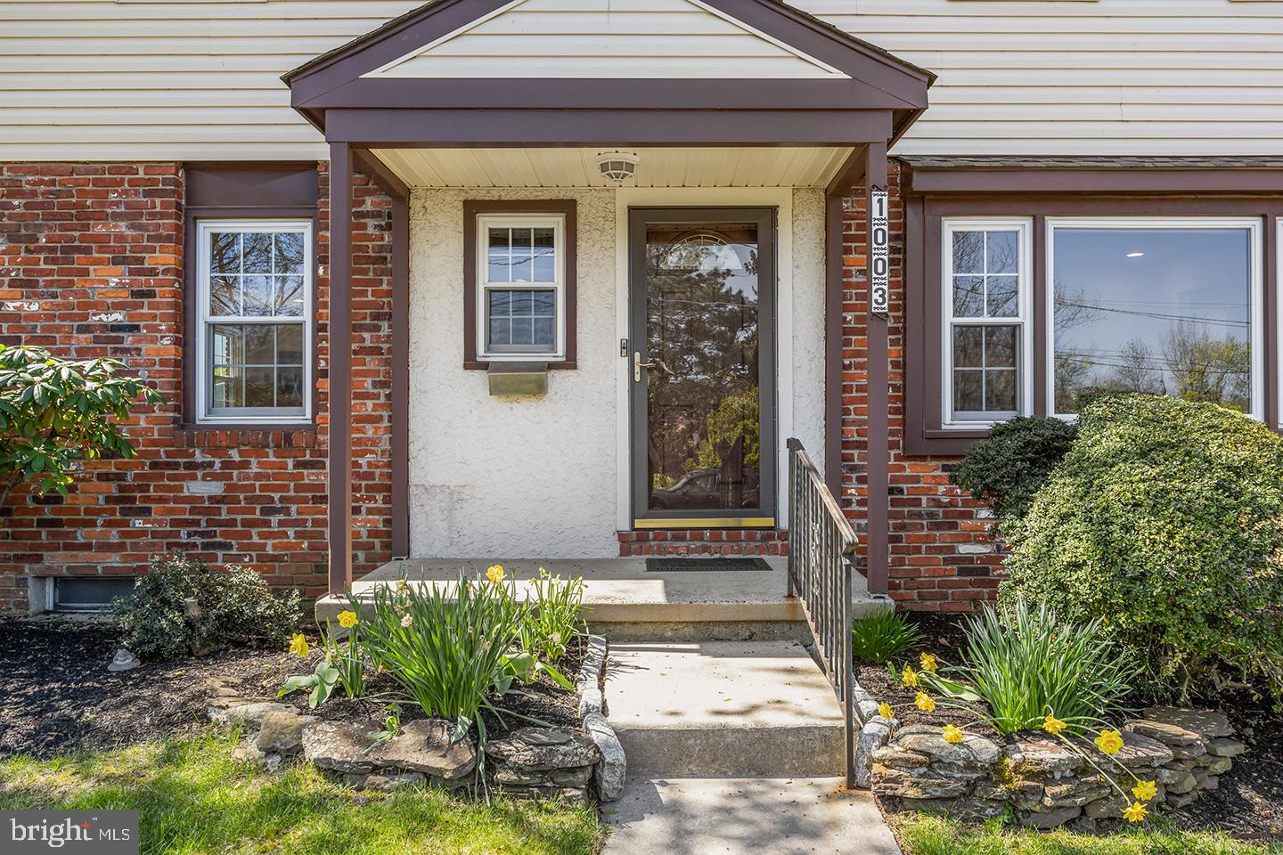 1003 Roumfort Avenue Cherry Hill, NJ 08034 - Photo 3 of 37 a front view of a house with a garden