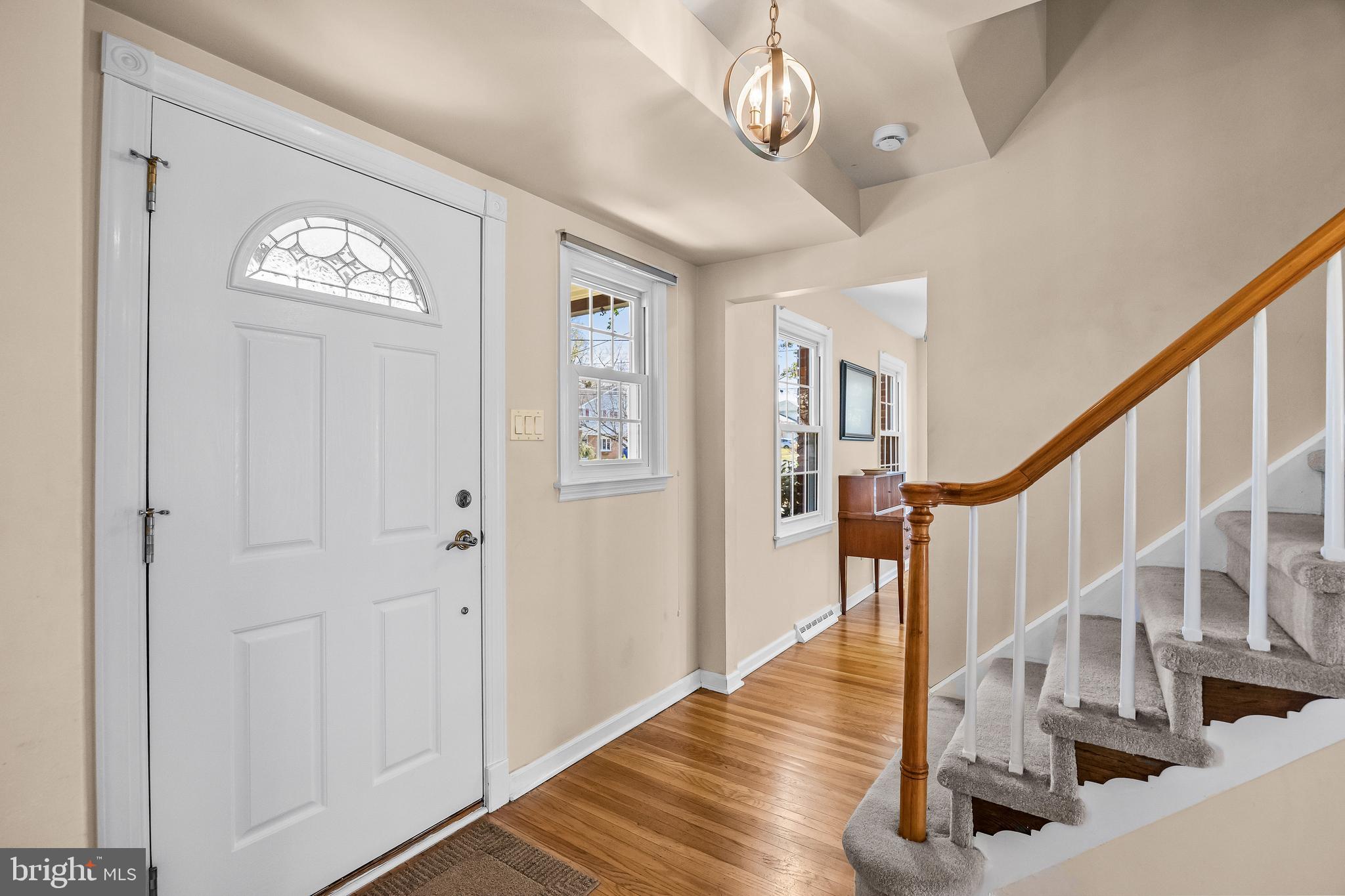 1003 Roumfort Avenue Cherry Hill, NJ 08034 - Photo 5 of 37 a view of entryway with wooden floor and stairs